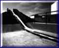 Childrens playground at Haddenham showing the slide on the side of a mound